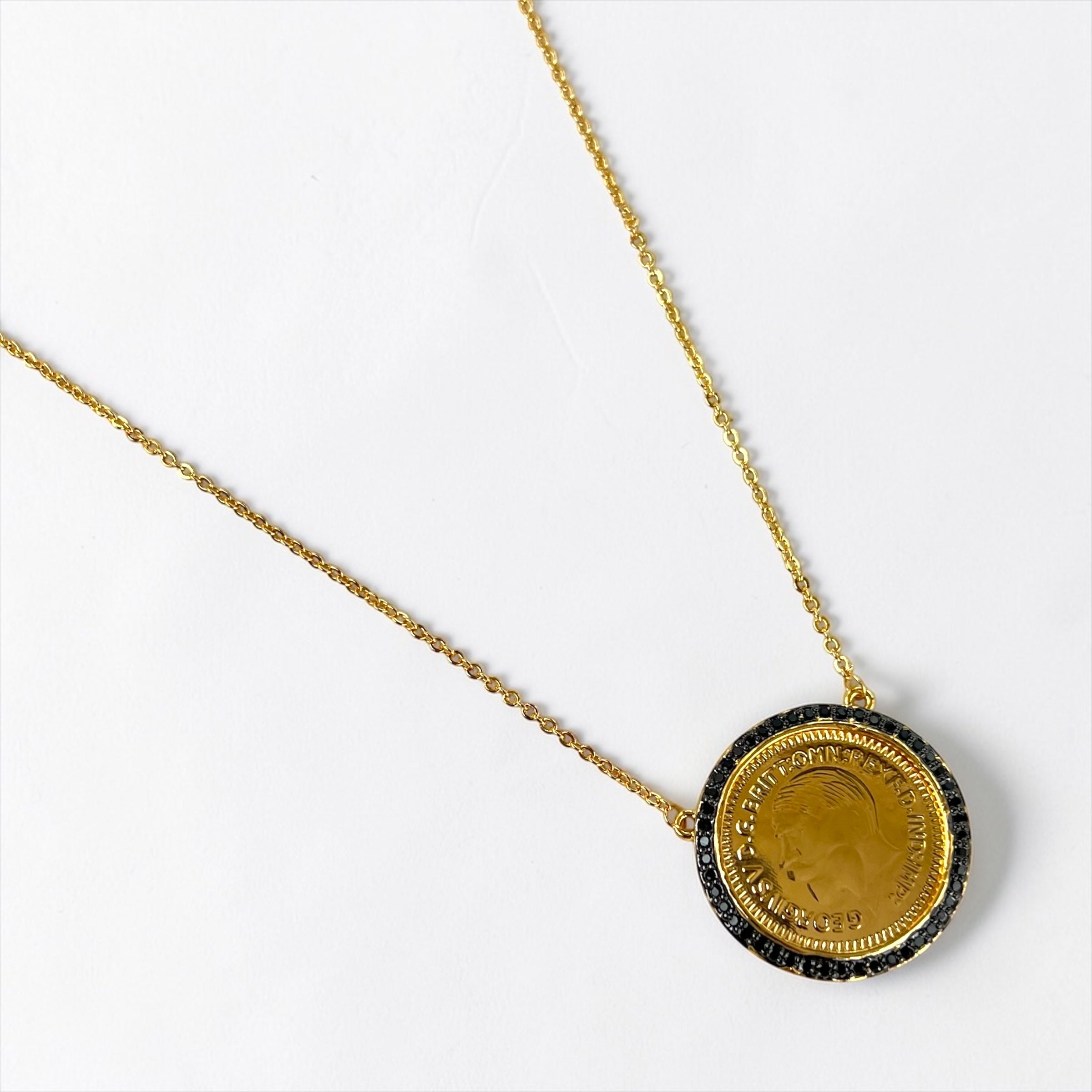 Gold Coin Pendant Necklace with Black Stone Frame