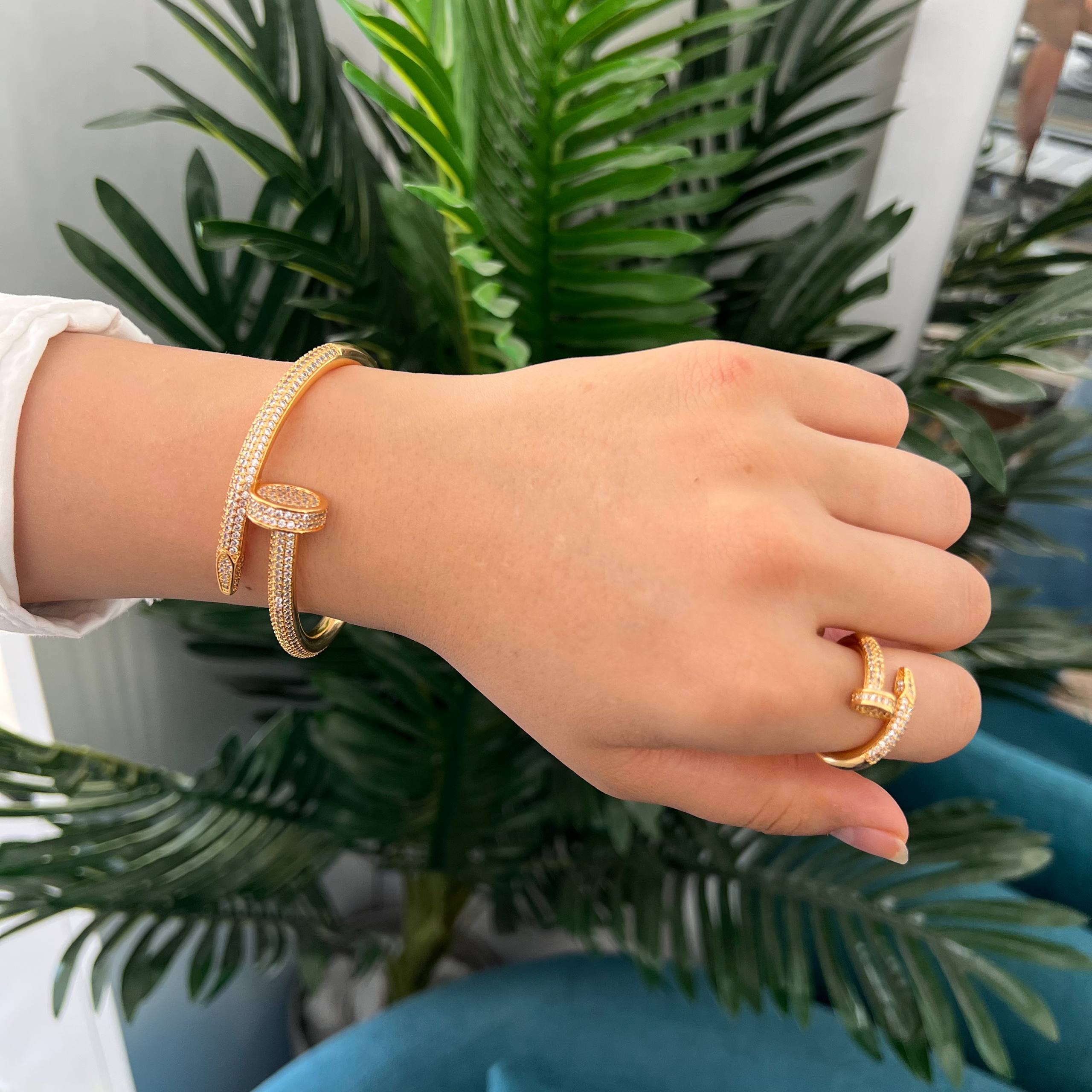 thick nail cartier– Gold bangle and ring