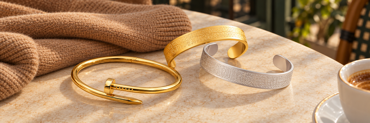Poshewix Bangles collection styled on a warm café table with camel knit