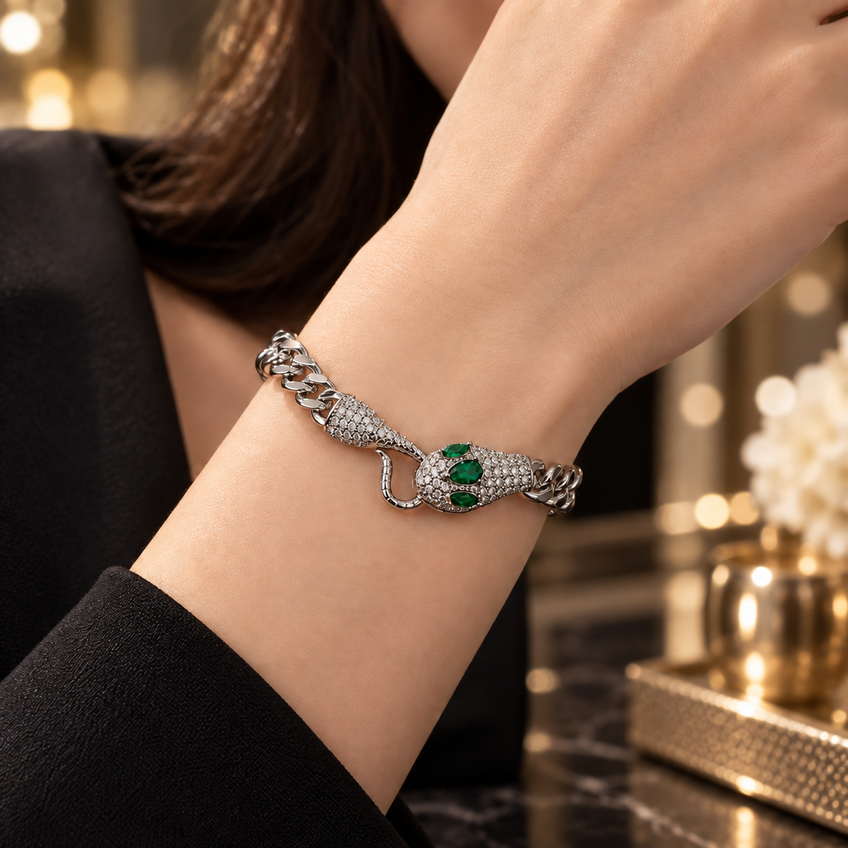 Silver Snake Head Bracelet with Emerald Accents