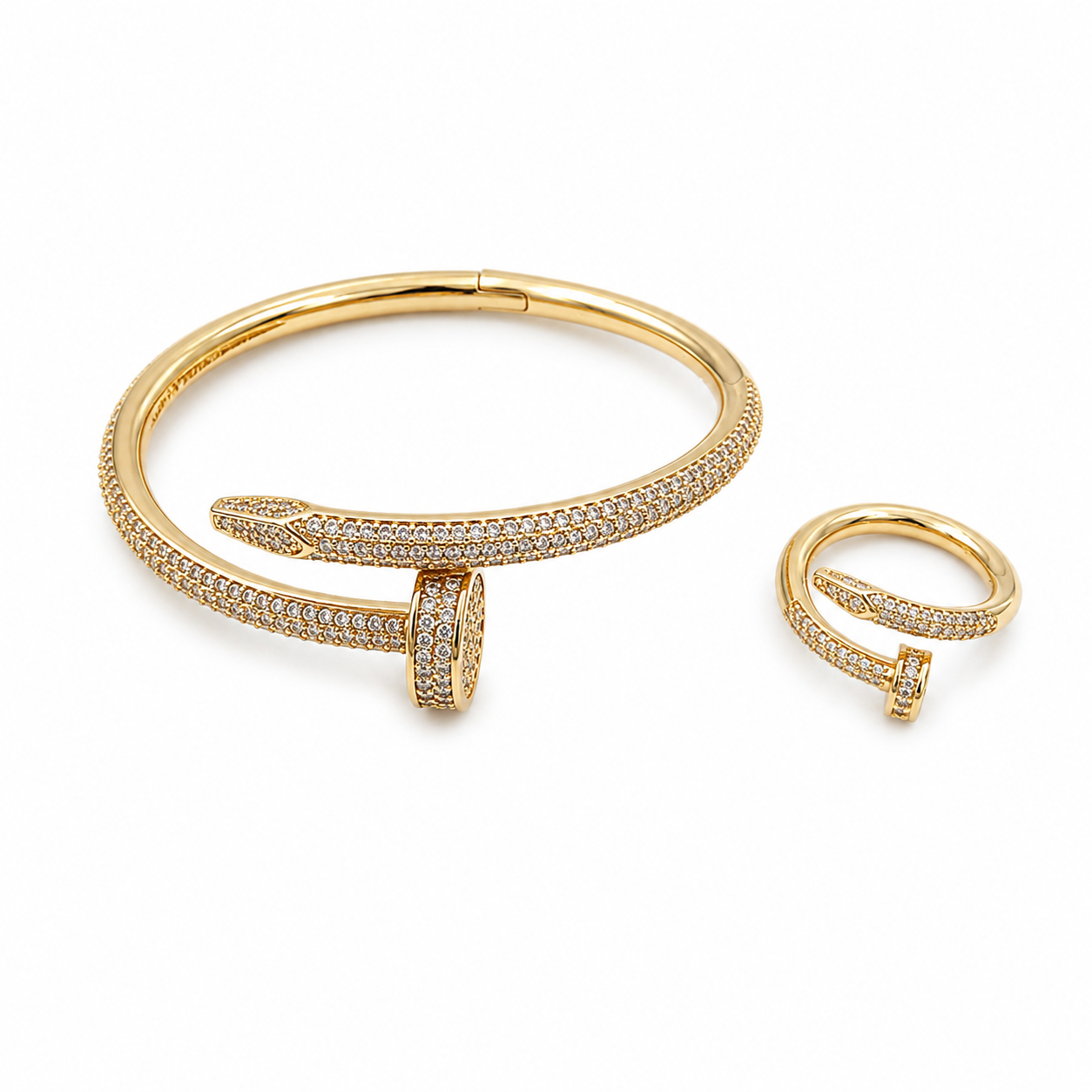 thick nail clue cartier– Gold bangle and ring