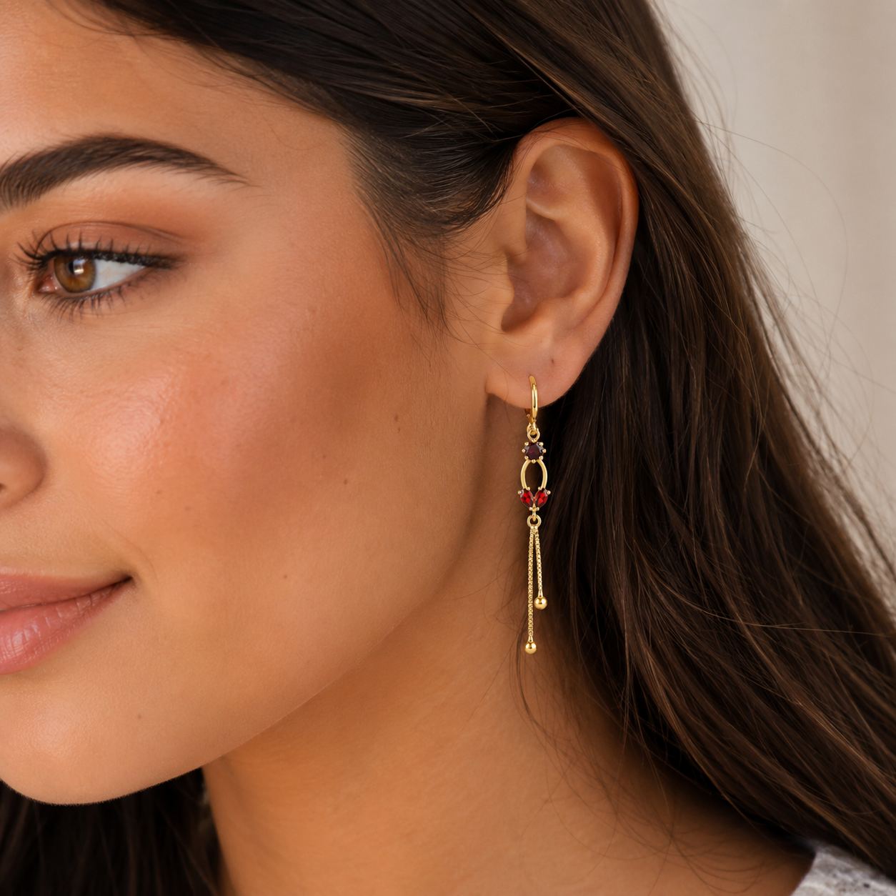 Gold-Plated Drop Earrings with Red Crystal Details