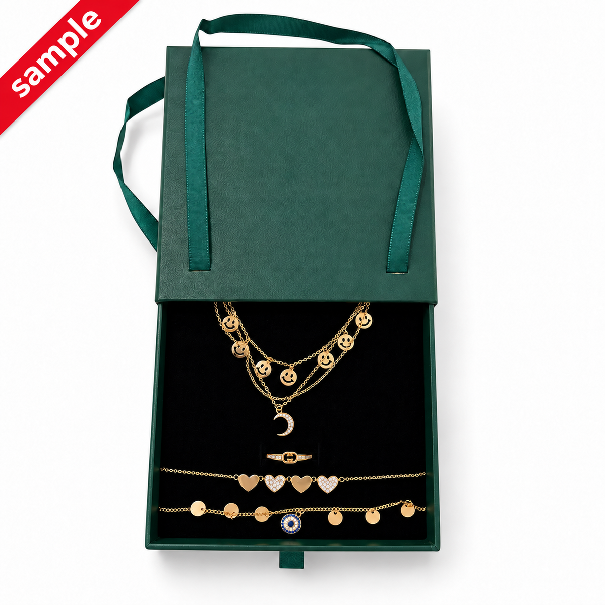 Poshewix Mystery Box sample: smiley necklace, heart bracelet, ring and charm bracelet (example contents)