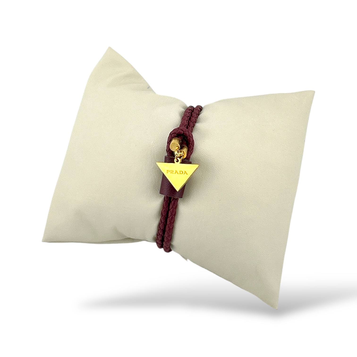 raided Leather Bracelet with Gold Prada Charm | Unisex Fashion Accessory