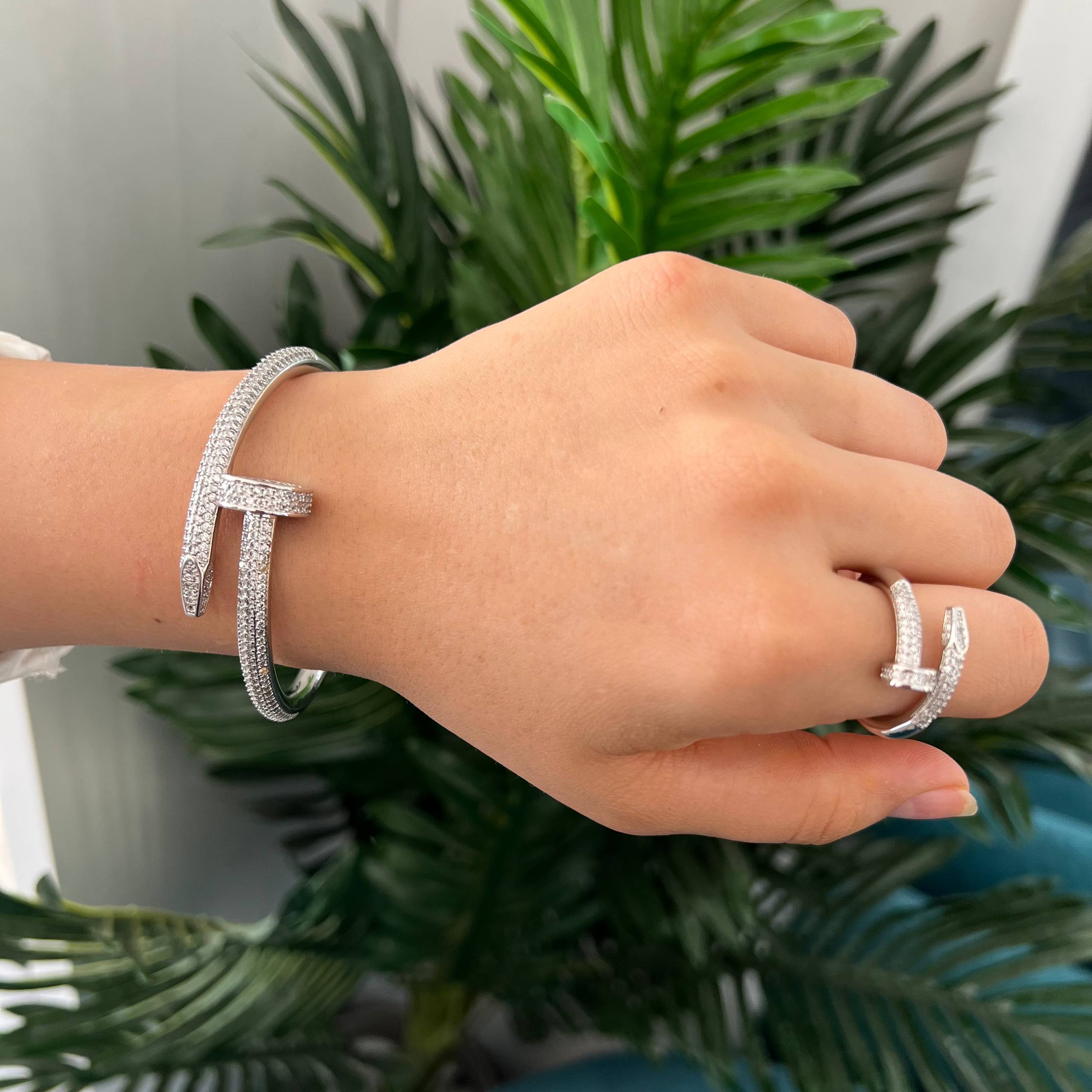 thick nail cartier– Gold bangle and ring