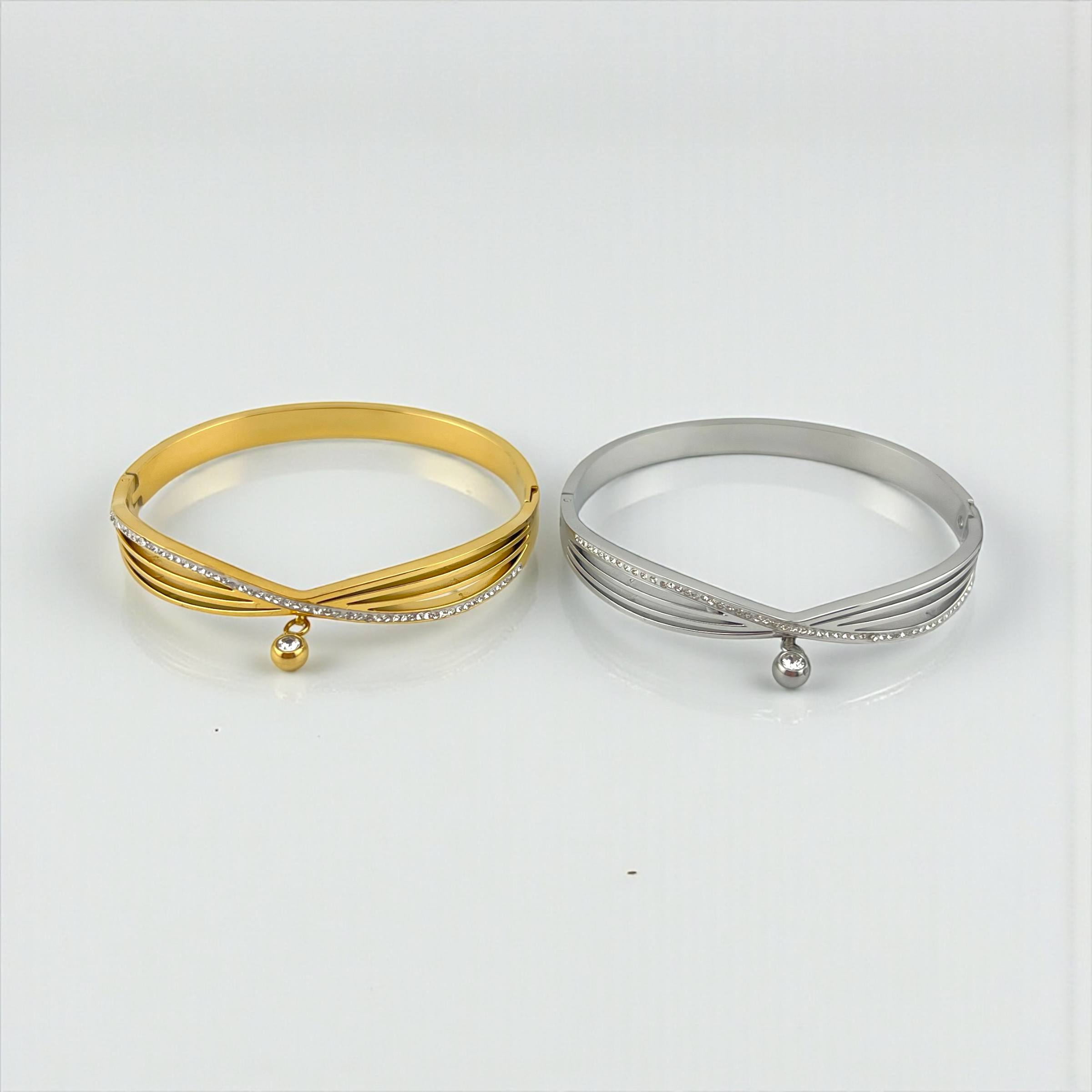 Twist Elegance Bangle with Crystal Charm – Gold & Silver