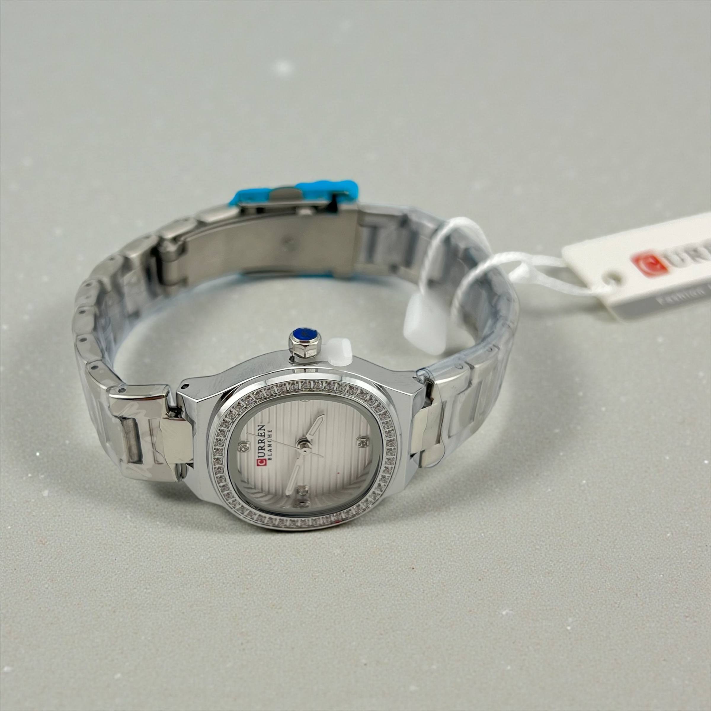 curren stone border dial watch